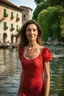 Placeholder: Act like a street photographer. Create a realistic photograph of a small Italian town at Como Lake in late spring with a 45-year-old, young look as her age, beautiful, slim Polish woman with brown hair and green eyes. Use wide lens and a Fuji T30 camera for mild light, warm, golden hour photos from a distance, elegant red dress, romantic pose, Richard Avedon style