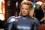 Placeholder: Jeri Ryan as Seven Of Nine (Star Trek), she is waiting in Quark's bar