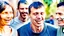 Placeholder: four happy people discussing health and wellness on a street, close up, bokeh