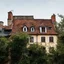 Placeholder: An odd village, details of the houses very accentuated, Max Ernst style, Hasselblad h6d400c