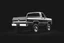 Placeholder: 1973 Chevrolet square body truck 4x4 facing a little to the left, dark gray background, high contrast black and white vector