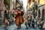 Placeholder: "The Cat Pied Piper of Hamelin, dressed in flowing, colorful Renaissance garments, playing a magical flute, followed by a majestic parade of cats in all sizes and colors, walking in perfect harmony along old cobblestone streets, Renaissance buildings with ivy, curious townsfolk leaning out of balconies with astonished faces, golden-hour lighting, high fantasy, highly detailed, 8K, hyper-realistic, magical realism --v 7 --ar 21:9 --style raw --q 2"