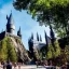 Placeholder: Harry Potter world with magic with beautiful surroundings with clear features of people and avatars, big fight with dark theme