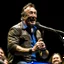 Placeholder: Bruce Springsteen sings "Tougher Than the Rest" on stage