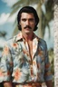 Placeholder: Elvis Presley with medium length bob-styled brown hair, a mustache, wearing a Hawaiian shirt and Bermuda shorts- well-lit, UHD, 1080p, professional quality, 35mm photograph by Scott Kendall