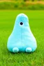 Placeholder: plush toy(tall and skinny blob with 1 eye) small feet at front, in a field of short grass
