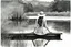 Placeholder: A long hair nice woman in a long vintage dress and hat sitting on the edge of a lake dock looking into the water, her reflection in the water, pale colors, black and white colors, peaceful mood, minimalist background, watercolor, style by Waterhouse, Cezanne, Jian Wu, Claude Monet, Christine Misencik-Bunn