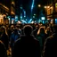 Placeholder: dark city at night, lots of people, blurred, focus on one person in the middle