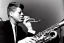 Placeholder: John f kennedy playing saxophone with his eyes closed