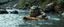 Placeholder: ancient ogre troll in kayak in stream