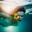 Placeholder: eva herzigova underwater with yellow flowers for hair, closed eyes, rtx, reflection, 8k, glow, winning photography, caustics