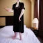 Placeholder: Realistic photo Russian shorthair beautiful 20-years guy boyish boylike wide hips in black nightgown in hotel