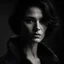 Placeholder: close-up portrait of a beautiful girl in a dark room, dark hair with graying, short stylish haircut, eyes reflecting the light source, natural fur collar under the neck, stylish black and white photography in the style of Peter Lindbergh