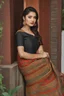 Placeholder: Aesthetic, 3D, Digitized, Hyper realistic, Surreal, Mesmeric, "Assamese Ethnic Tribal / Traditional Woven Women Attire" & Textile (Handloom) Industry themed Mekhela Chador (The bottom half of this distinct dress is called the 'Mekhela ', a round fit used waist downwards over a petticoat) designs, **Featured Designs:** The CEO - A high-powered executive sporting one-of-a-kind Assamese designs tailored for the global business elite. **Appearance:** Fictional female models endorsing; franchising; r