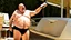 Placeholder: bald old fat guy in a halter top and panties yelling on the phone