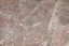 Placeholder: scratched garage floor, low angle
