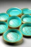 Placeholder: Set of ten ceramic pastel cyan plates with a golden grid on