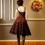 Placeholder: realistic photo 17-year-old boy Russian guy short male hairstyle short brown hair shorthair guy in women's cocktail dress that fit wide hips and lace tights beautiful cleavage big ass high heels delicate graceful with a very thin waist delicate thin very elegant with a very thin waist in lace stockings with heels in the restaurant new year