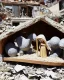 Placeholder: Nativity scene bomb rubble Ukraine baby