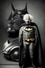Placeholder: Albert Einstein dressed up as Batman, and standing beside the Batmobile