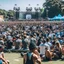 Placeholder: public going on stage in a music festival