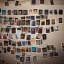 Placeholder: Room filled with Polaroid pictures stacked from ground to roof