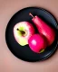 Placeholder: Pink Apple and red pear on a black dish