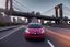 Placeholder: A Tesla 'Semi' (semi truck) is going at a high speed, on the 'FDR Drive', eastern Manhattan. (CINEMATIC, WIDE ANGLE LENS, PHOTO REAL)