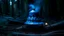 Placeholder: bell-shaped object with smooth metal surface without pattern crashed on its side buried and smoking in the middle of the forest after dark glowing blue