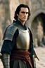 Placeholder: Joaquin Phoenix from year 2000, beachy haircut, black hair, in medieval setting, in burnished medieval samurai armor