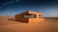 Placeholder: Amidst the desert, a bold house rises among the dunes. The rectangular orange base blends seamlessly with the sandy hues, creating an illusion of continuity with the landscape. The upper floor, with its angular forms and glass walls, catches the blazing sun and the vast stars of the night sky.