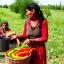 Placeholder: woman giving a jar of peppers to gypsies