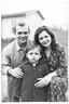 Placeholder: 80's, child photo, homemade realistic, old photo, cracks, black and white, low quality, photo with parents