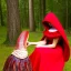 Placeholder: flirty red riding hood stroking her bearded clam