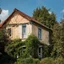 Placeholder: An odd village, details of the houses very accentuated, Max Ernst style, Hasselblad h6d400c, old lady