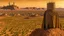Placeholder: Desert warrior from behind looking at a city on a plato in the distance,