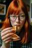 Placeholder: girl with ginger hair in a fringe with glasses and a septum piercing eating a toastie