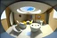 Placeholder: interior de un plano circular 3d con un baño adaptado para minisvalidos una sala unificada de reuniones y charlas y otra sal de exposicion