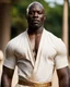 Placeholder: Adewale Akinnuoye-Agbaje x morris chesnut as a handsome dark skinned and muscular heavy set man with a bald head and neatly trimmed beard. Shirtless and wearing pale linen trousers. he has a gold earing in his left ear. he has a dominant expression on his face