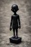 Placeholder: an ominous small statuette made of black stone, incomprehensible inhuman shape, surreal, strange