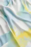 Placeholder: white background, trapeze shirt, mix of cotton and light wool, tempera effect, spots of color between pastel tones of sky blue, pistachio green, bright yellow and ash gray