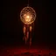 Placeholder: hoop and web of a dreamcatcher, made of light, glowing internal light, translucent, natural red/brown tones, brown dirt ground long bottom, dark background, fantastic lighting