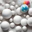 Placeholder: White balls painted with brushes and colours