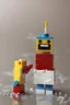 Placeholder: lego man eating glue