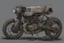 Placeholder: motorcycle, comic book,post-apocalypse, gray background,