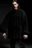 Placeholder: Man's large and long and black knitted Poliedric jumper and bell shape sleeves