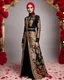 Placeholder: Full length Luxury potrait of a beautiful super model hijab beauty makeup cosmetic,she wearing islamic a luxurious details pattern color gold and black casual jacket with designed large flower details that resemble roses.The dress has an asymmetrical design with one sleeve and a flowing skirt.background of the image shows a red carpet event with floral decorations,close-up portrait