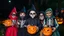 Placeholder: Halloween celebration, young children in disguises, fancy dress, scary masks, skeleton, trick-or-treat, fun, happy, excitement, carved-pumpkin-faces, spooky, night, award-winning photograph