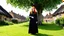 Placeholder: A red-haired, witchy woman standing in the centre of a village green, surrounded by thatched cottages, standing under a large tree. Bright, sunny day.