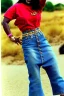 Placeholder: year 1996 denim fashion. Loose skirt, low waist. Combat pants and t-shirt. Colors: denim blue, blue, purple, cream, khaki, light green, lilac, plum, orange, terracotta, red, light yellow, pink, dark blue, beige. Latex in small part. Cheetah pattern. Gwen Stephani, Missy Elliot, Shirley Manson.Cargo pants